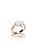 Load image into Gallery viewer, Silver ring with a diamond on a white background
